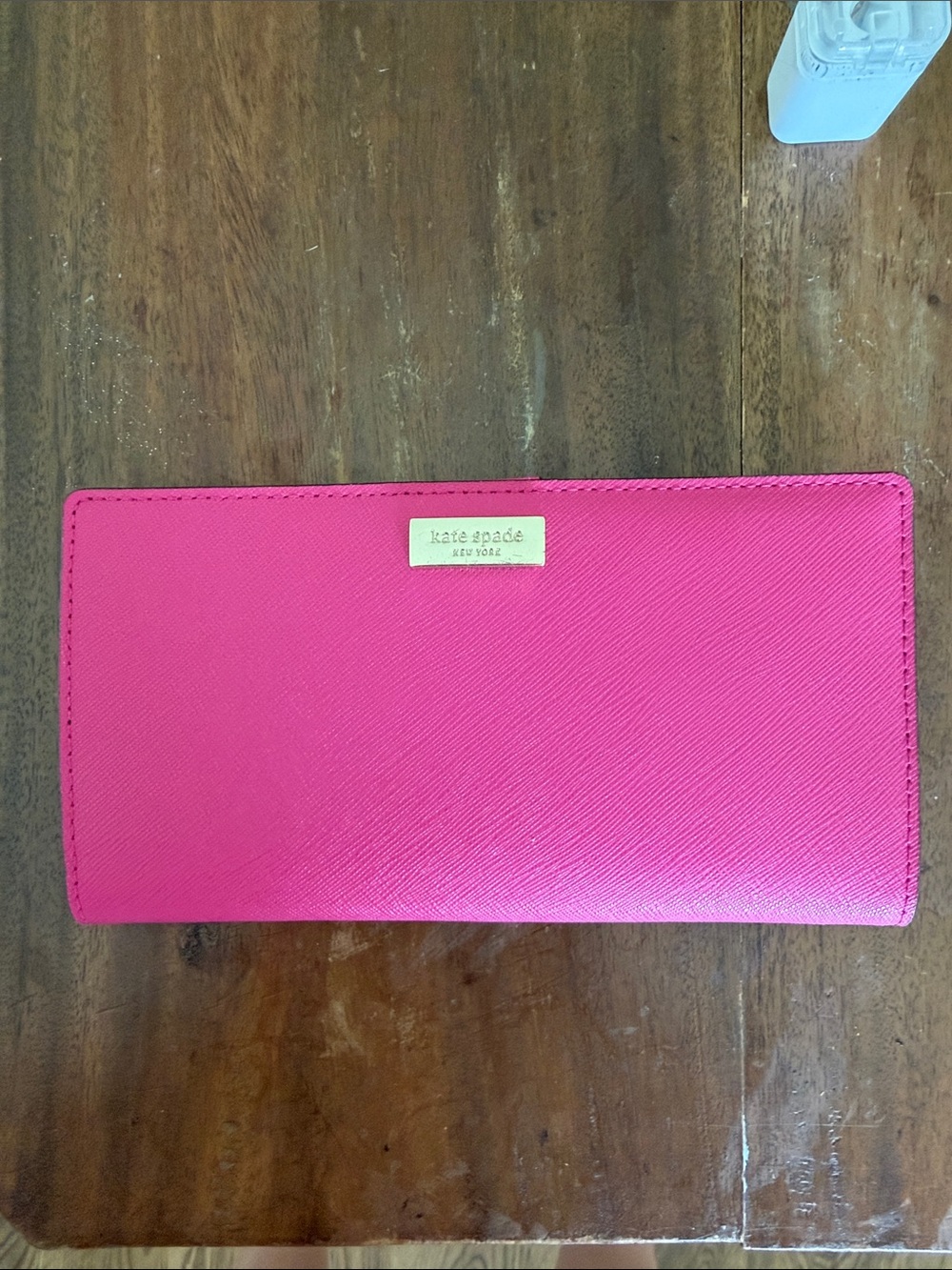 kate spade bright pink Saffiano leather continental wallet
